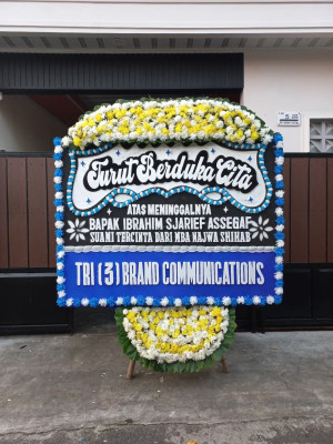 Papan Bunga Duka di Napan